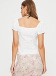 back view of model wearing Princess Polly Ashburn Top White Short Sleeves Sweetheart 