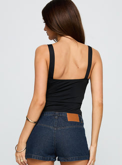 back view of model wearing Princess Polly Dubios Top Black Sleeveless Plunger 