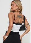 back view of model wearing Princess Polly Vickee Top White / Black Sleeveless Scoop Neck 