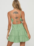 back view of model wearing Princess Polly Summer Break Mini Dress Sage Square Neck 