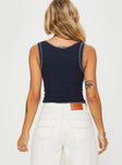 back view of model wearing Princess Polly Casado Top Navy Sleeveless Scoop Neck 