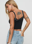 back view of model wearing Princess Polly Pippen Top Black Sleeveless Scoop Neck 