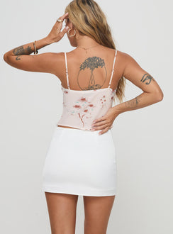 back view of model wearing Princess Polly Karley Satin Low Waist Mini Skirt White Mini Skirts 