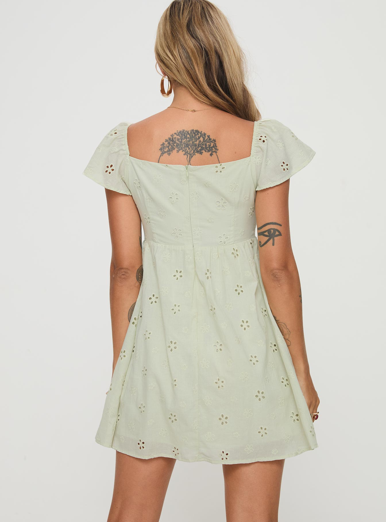 back view of model wearing Princess Polly Staban Mini Dress Sage Sweetheart Neckline 