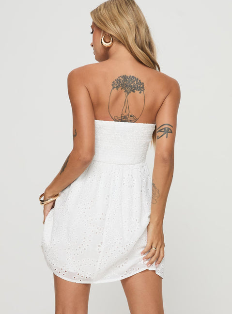 back view of model wearing Princess Polly Halleck Strapless Mini Dress White Straight Neck 