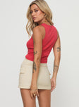 Cargo mini skirt Twin hip pockets, zip & button fastening with drawstring, belt looped waist Fit runs small Non-stretch material, unlined 