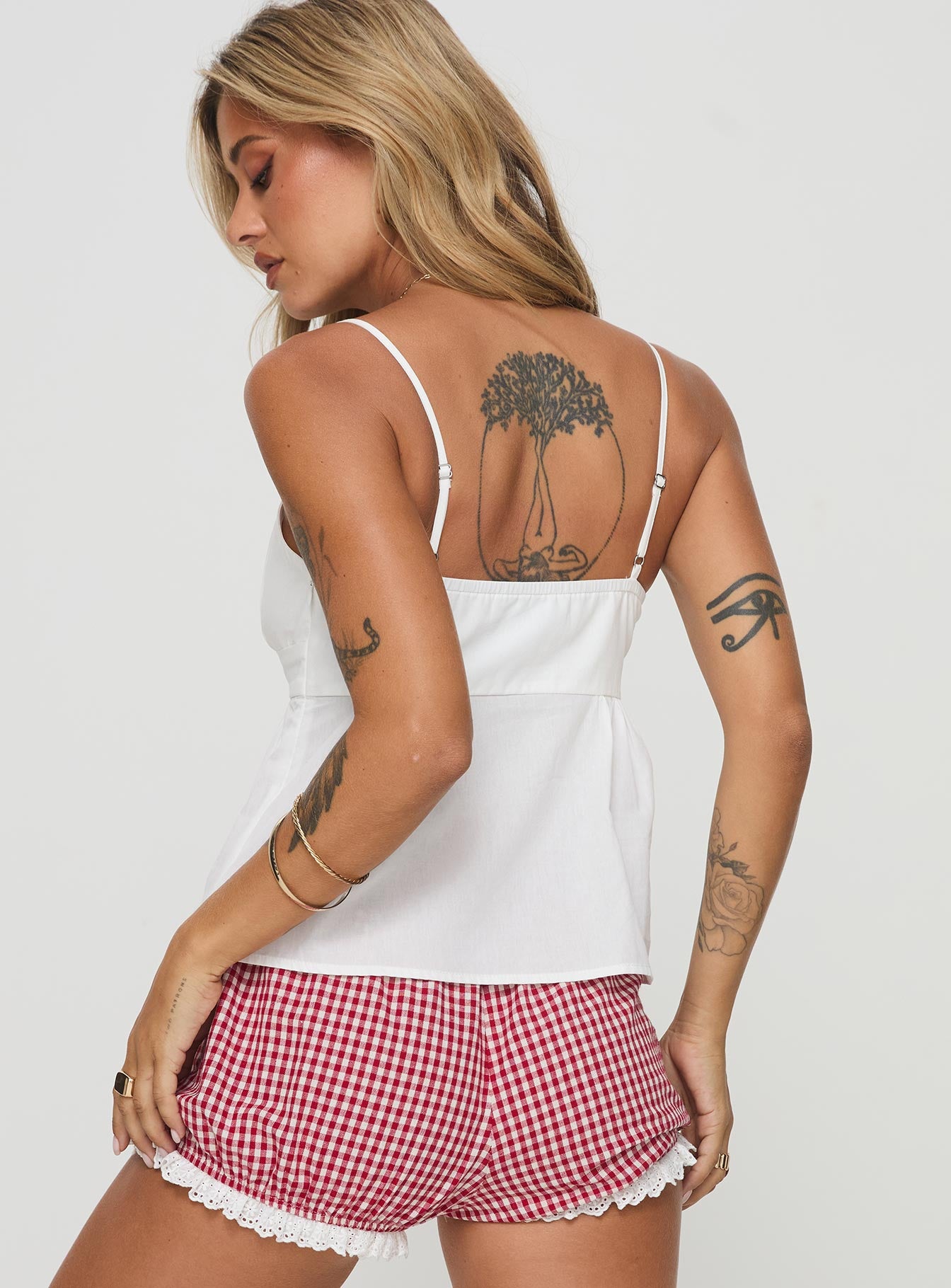back view of model wearing Princess Polly Caspia Top White Sleeveless Sweetheart 