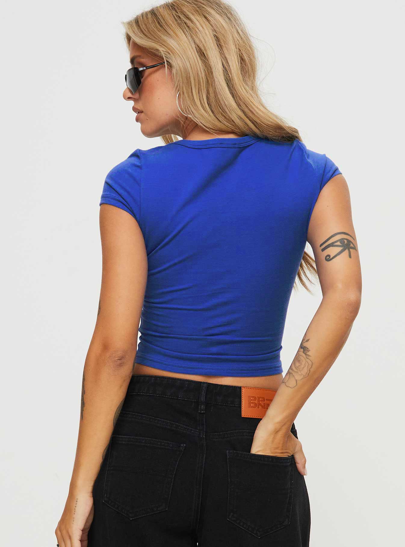 back view of model wearing Princess Polly Machina Tee Blue Short Sleeves Crew Neck 