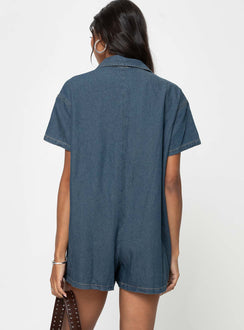 Dark wash denim romper Classic collar, button fastening down front, chest pocket, drop shoulder Non-stretch material, unlined 