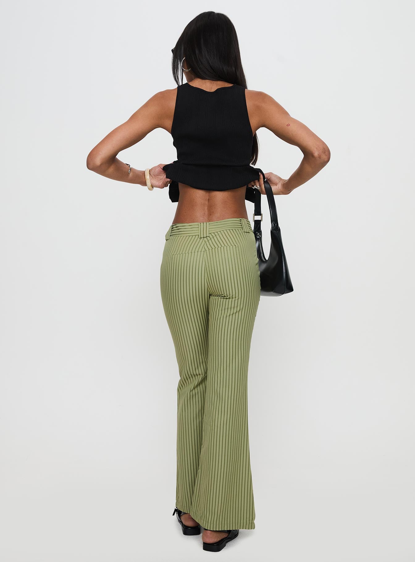 back view of model wearing Princess Polly Jinxed Pant Green Stripe 
