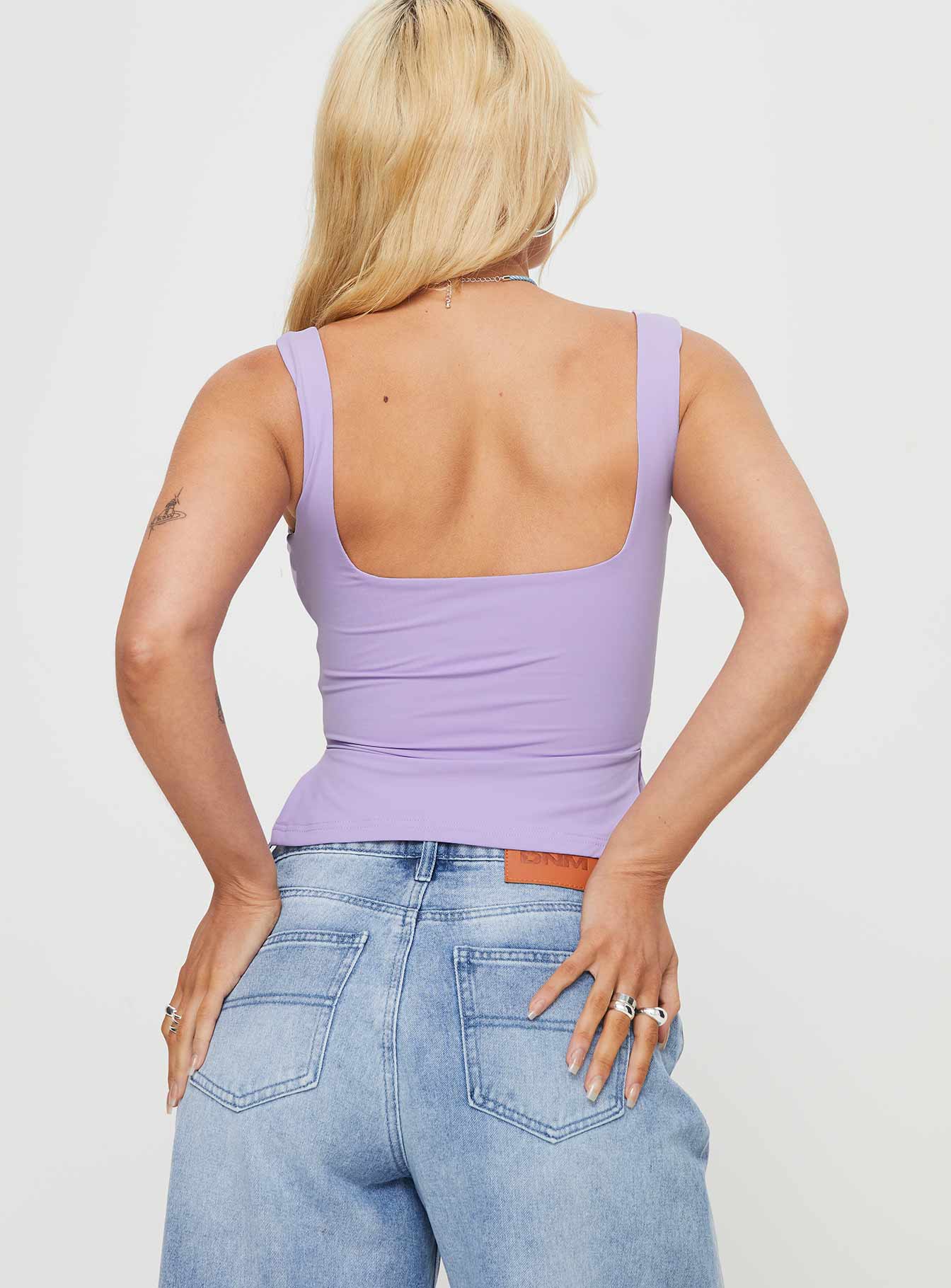 back view of model wearing Princess Polly Rehna Top Lilac Sleeveless Sweetheart 