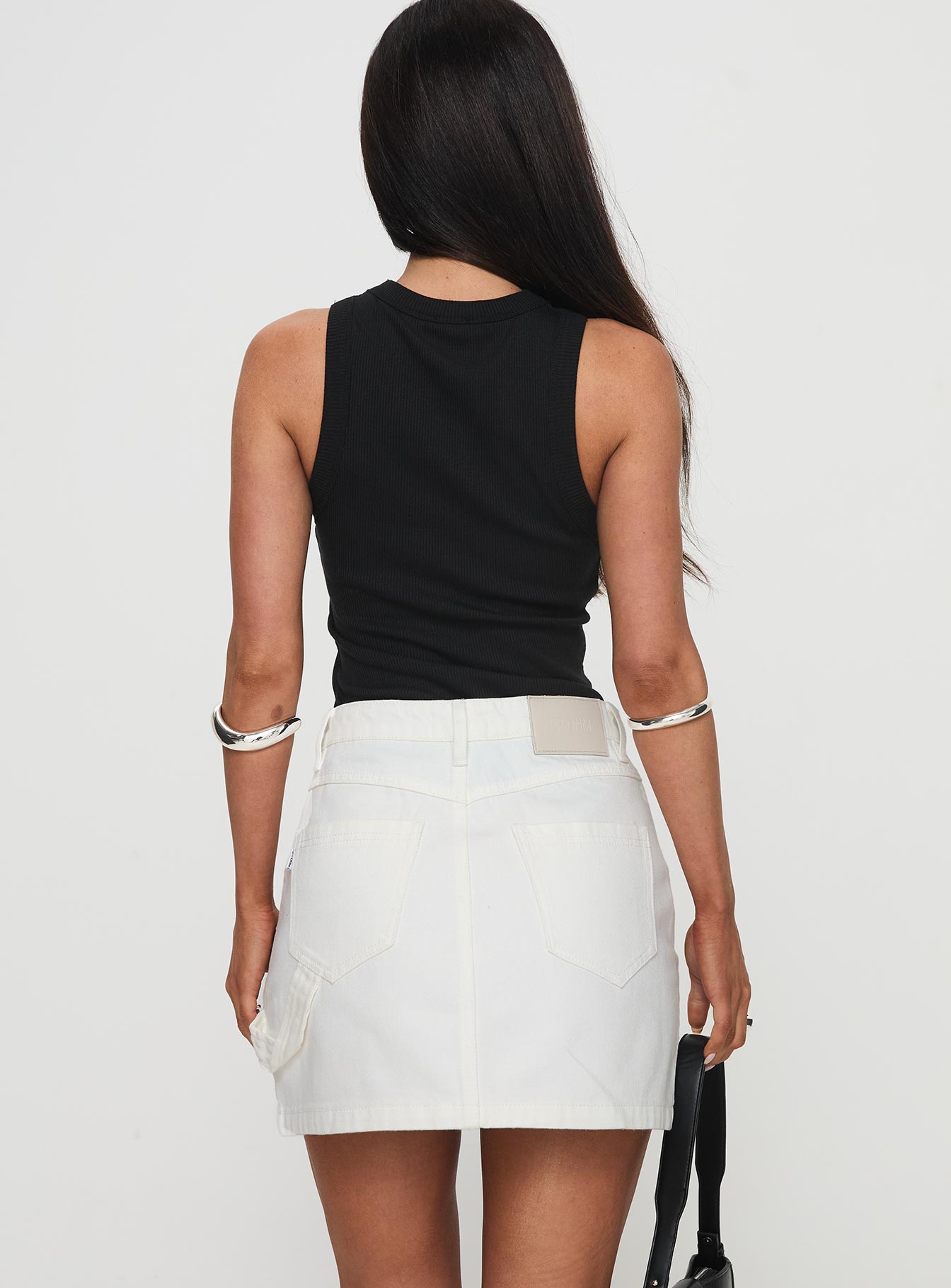 back view of model wearing Princess Polly Chillders Denim Mini Skirt White Mini Skirts 