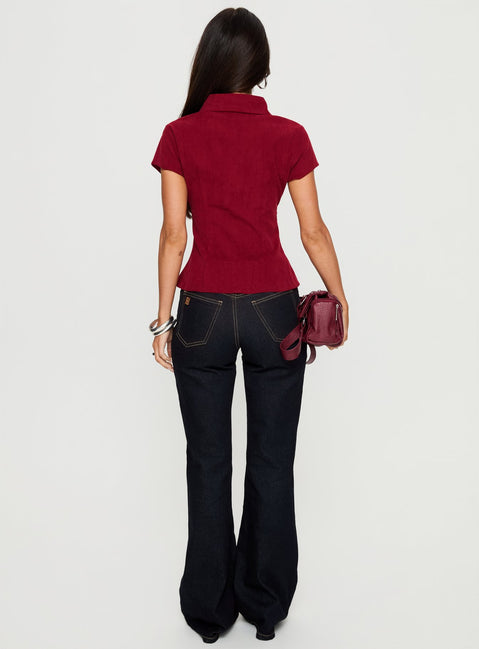 back view of model wearing Princess Polly Magic Mirror Mid Rise Bootleg Jeans Raw Indigo Mid Rise Jeans 