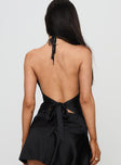 back view of model wearing Princess Polly Artemas Halter Top Black Sleeveless Cowl 