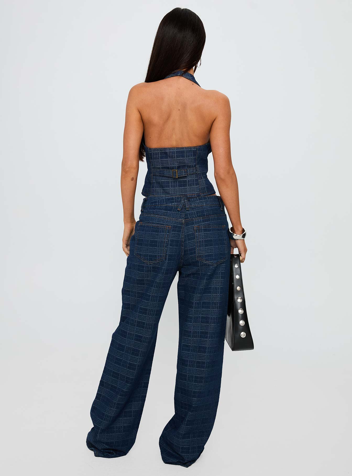 back view of model wearing Princess Polly Top Model Low Rise Straight Leg Jeans Indigo Plaid Mid Rise 