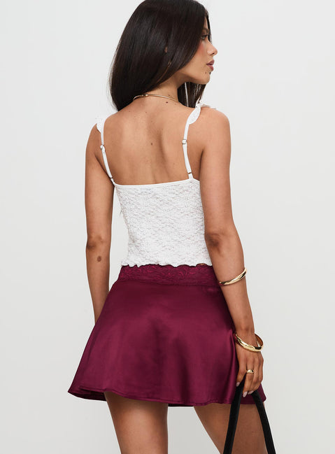 back view of model wearing Princess Polly For Me Mini Skirt Burgundy Mini Skirts 