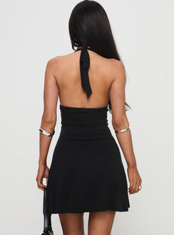 back view of model wearing Princess Polly Tinisie Halter Mini Dress Black Petite Plunger 