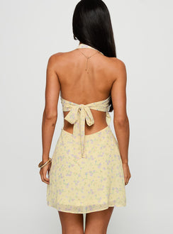 back view of model wearing Princess Polly Rosamie Halter Mini Dress Cream / Floral Square Neck 
