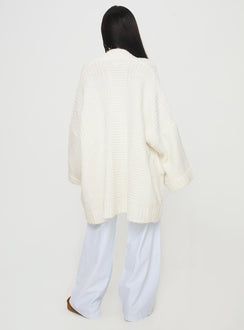 back view of model wearing Princess Polly Paisleigh Cable Knit Cardigan Cream Long 
