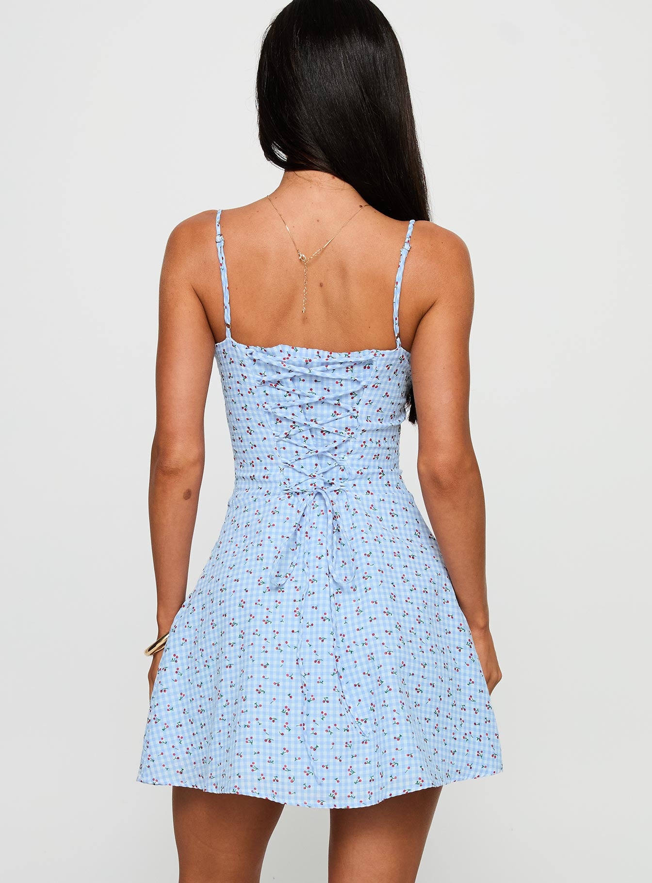 back view of model wearing Princess Polly Good Chemistry Mini Dress Blue Multi Sweetheart Neckline 