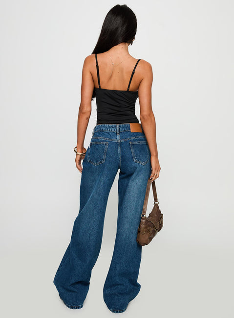 back view of model wearing Princess Polly Duster Oversized Jeans Dark Wash Mid Rise 