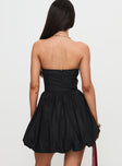 back view of model wearing Princess Polly Melaina Bubble Hem Mini Dress Black Sweetheart Neckline 