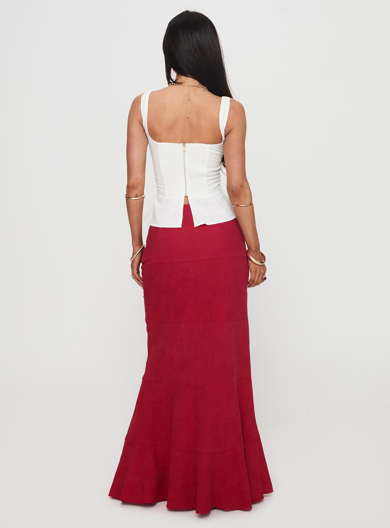 back view of model wearing Princess Polly Raven Mid Rise Maxi Skirt Red Maxi 