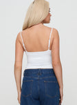 back view of model wearing Princess Polly Evanda Top White Sleeveless Sweetheart 