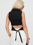 back view of model wearing Princess Polly Campus Long Line Vest Black Sleeveless V-Neck 