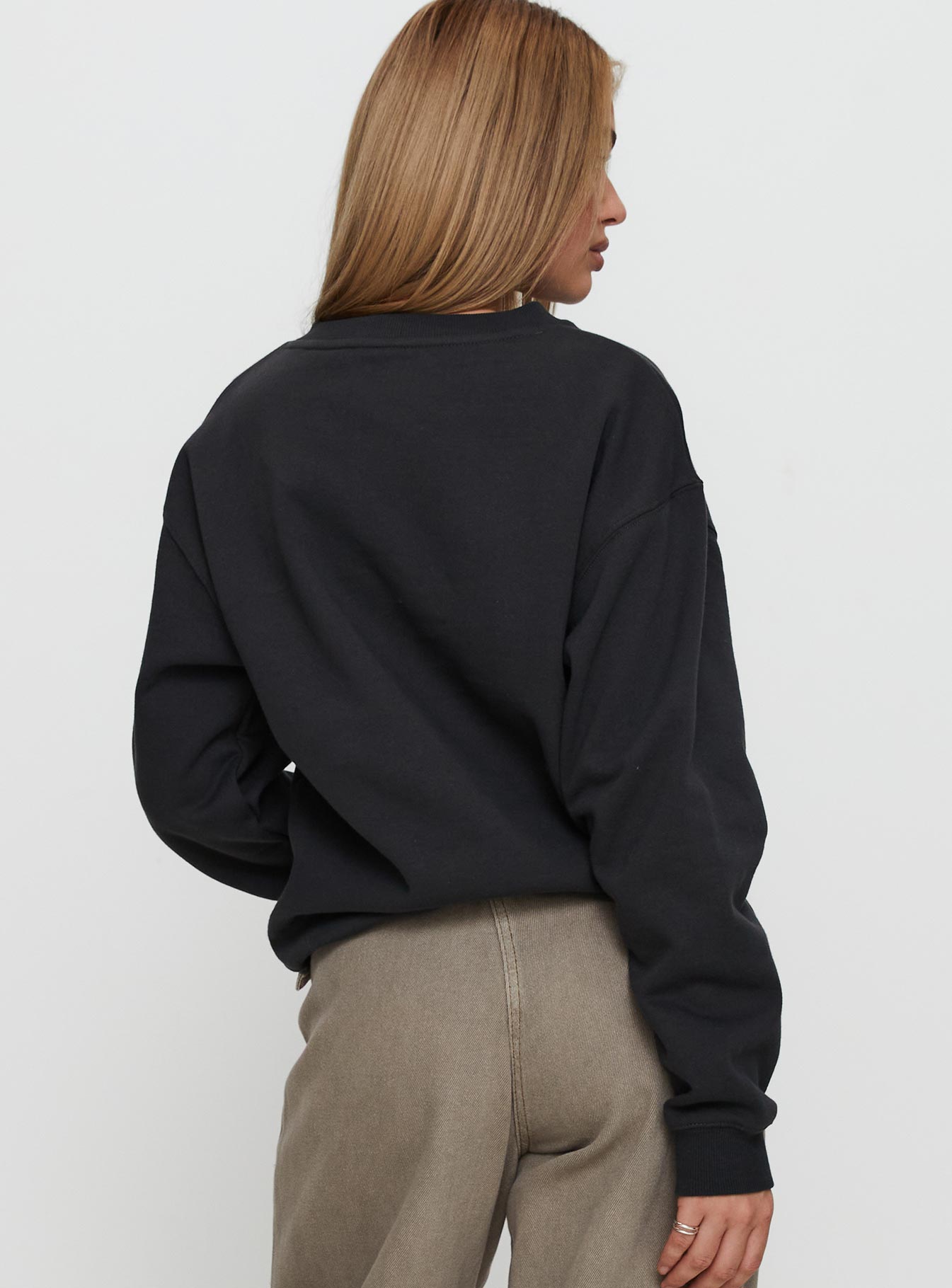 back view of model wearing Princess Polly Wild In NYC Sweater Black 