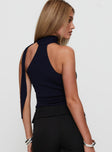 back view of model wearing Princess Polly Anderstone Neck Tie Top Navy Sleeveless Asymmetric Neckline 