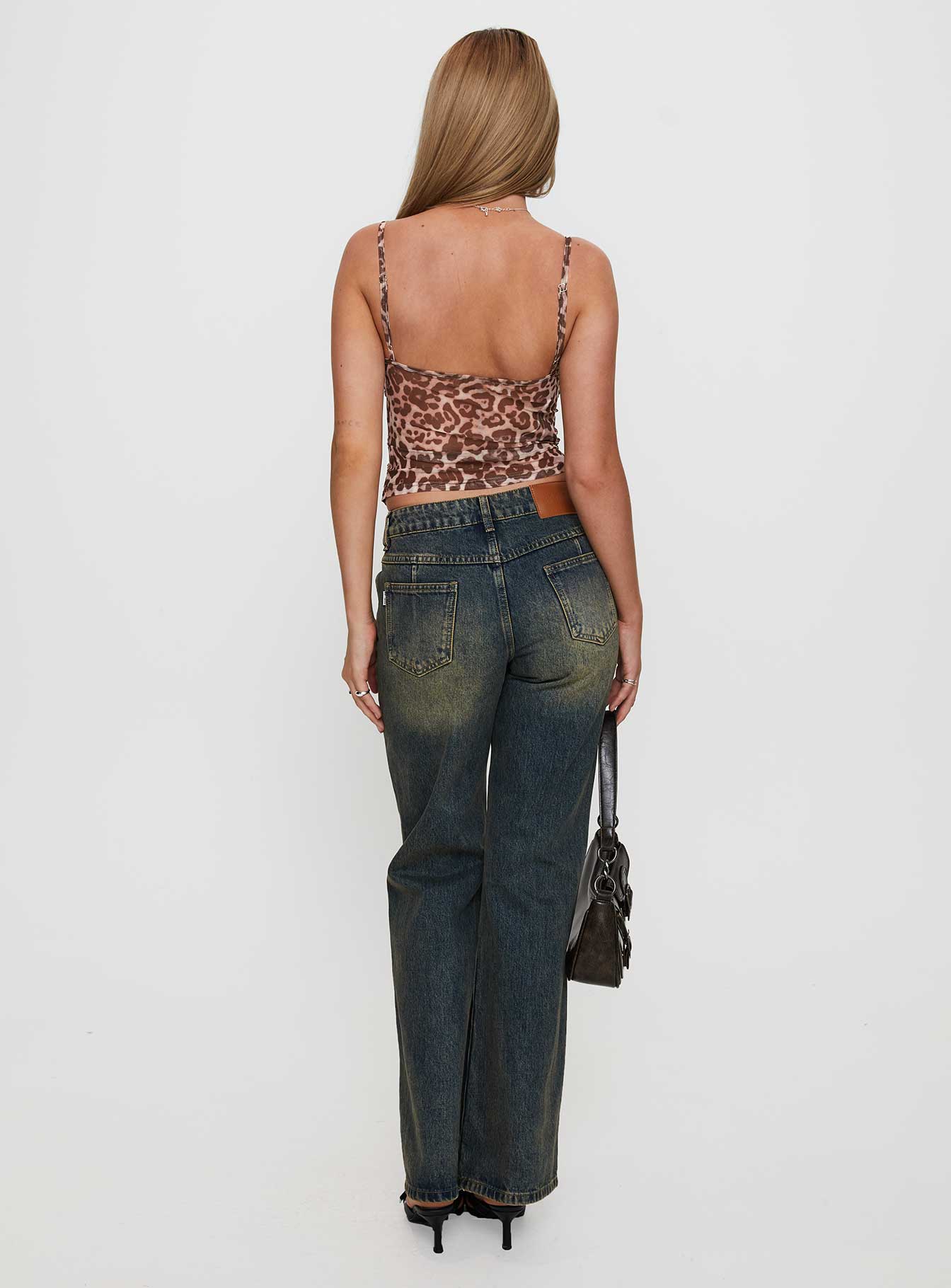 back view of model wearing Princess Polly Inverness Pinched Detail Wide Leg Jean Tea Mid Rise 
