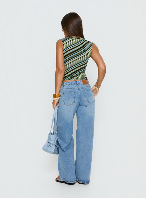 back view of model wearing Princess Polly Ramos Low Rise Denim Jeans Bright Blue Wash Mid Rise Jeans 