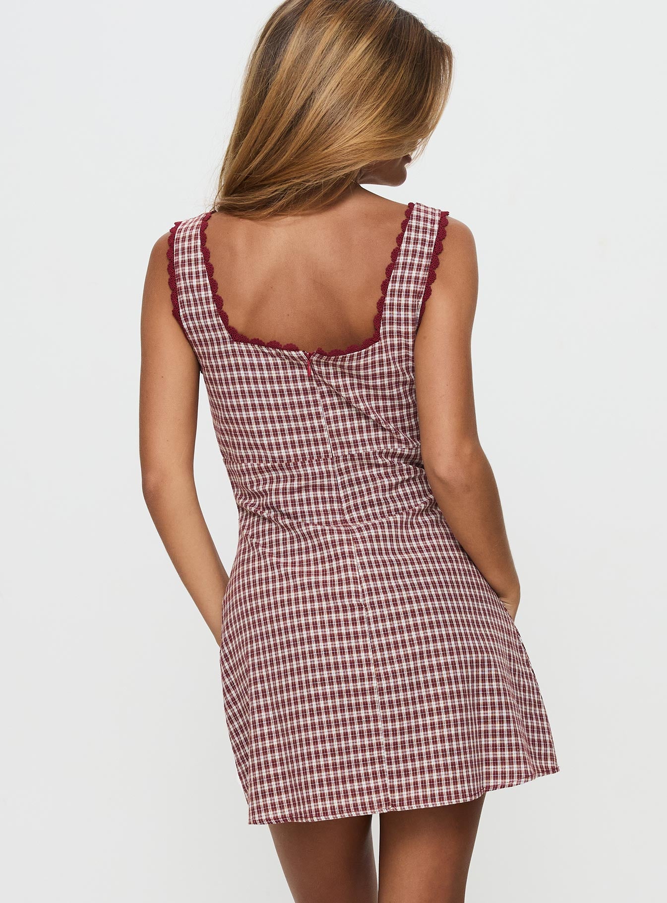 back view of model wearing Princess Polly Dasha Mini Dress Red Check Square Neck 