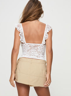 back view of model wearing Princess Polly Jadiel Asymmetric Cargo Skort Beige High Waisted Shorts 