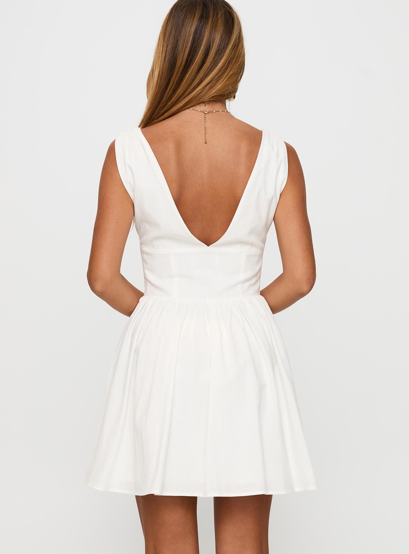 back view of model wearing Princess Polly Mattison Plunge Mini Dress White Plunger 