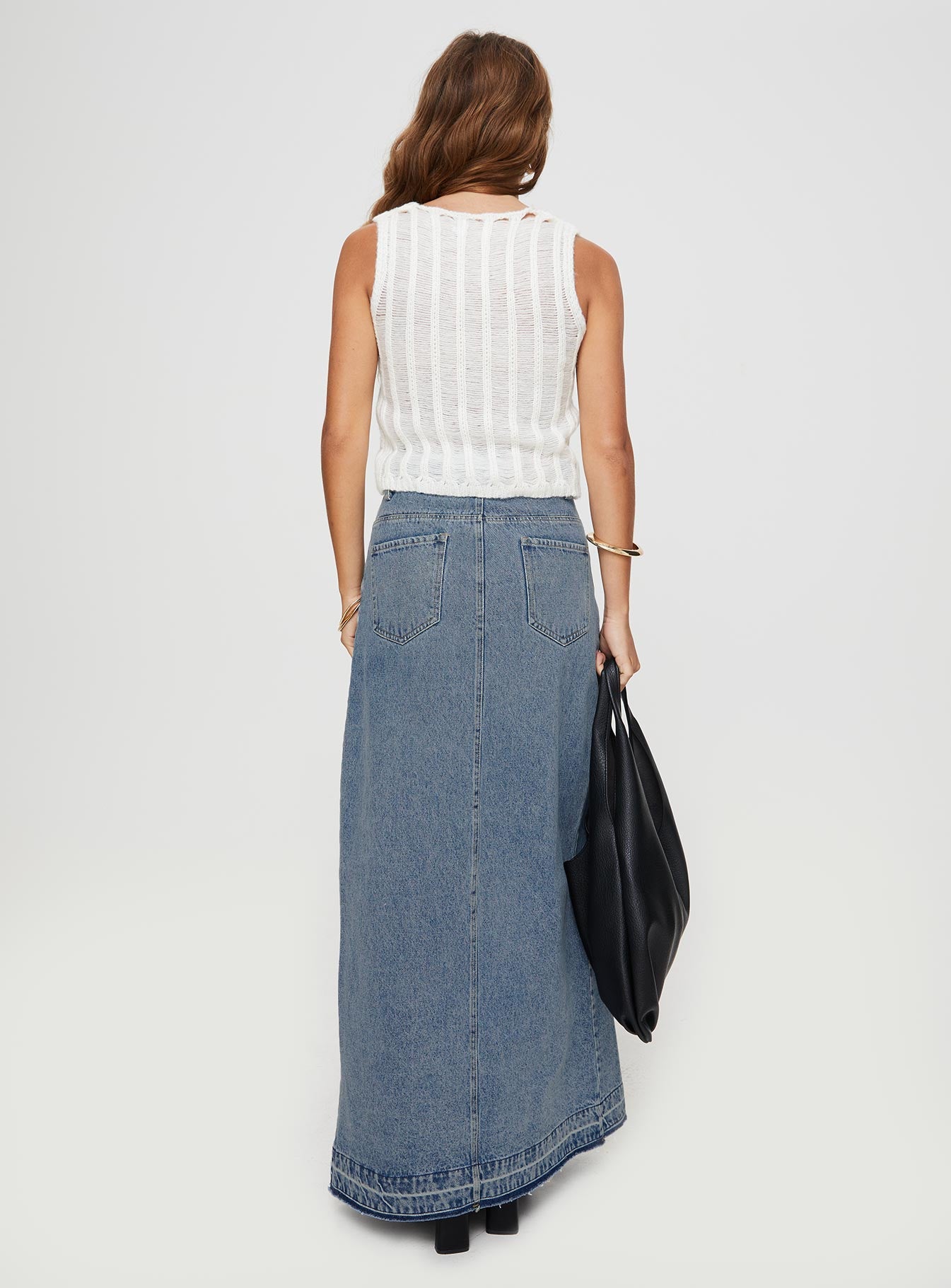 back view of model wearing Princess Polly Deneuve Denim Maxi Skirt Mid Wash Maxi 