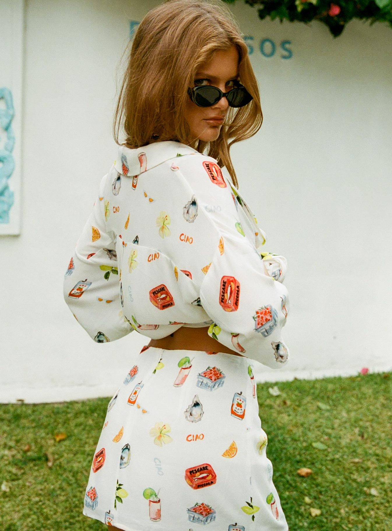 back view of model wearing Princess Polly Caraliia Shirt White / Multi Three Fourth Sleeves V-Neck 