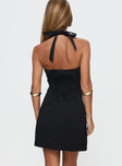 back view of model wearing Princess Polly Mallorie Halter Mini Dress Black Scoop Neck 