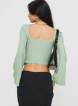 Long sleeve top Twist detail at bust, flared sleeve, inner silicone strip at bust, split hem Good stretch, lined bust
