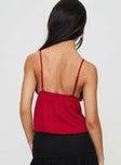 back view of model wearing Princess Polly Missoura Top Red Sleeveless Plunger 