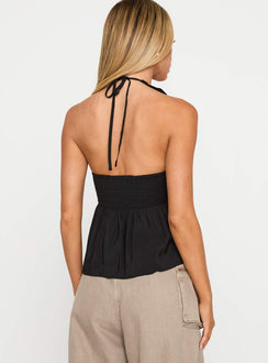 back view of model wearing Princess Polly Gadot Halter Top Black Sleeveless Plunger 