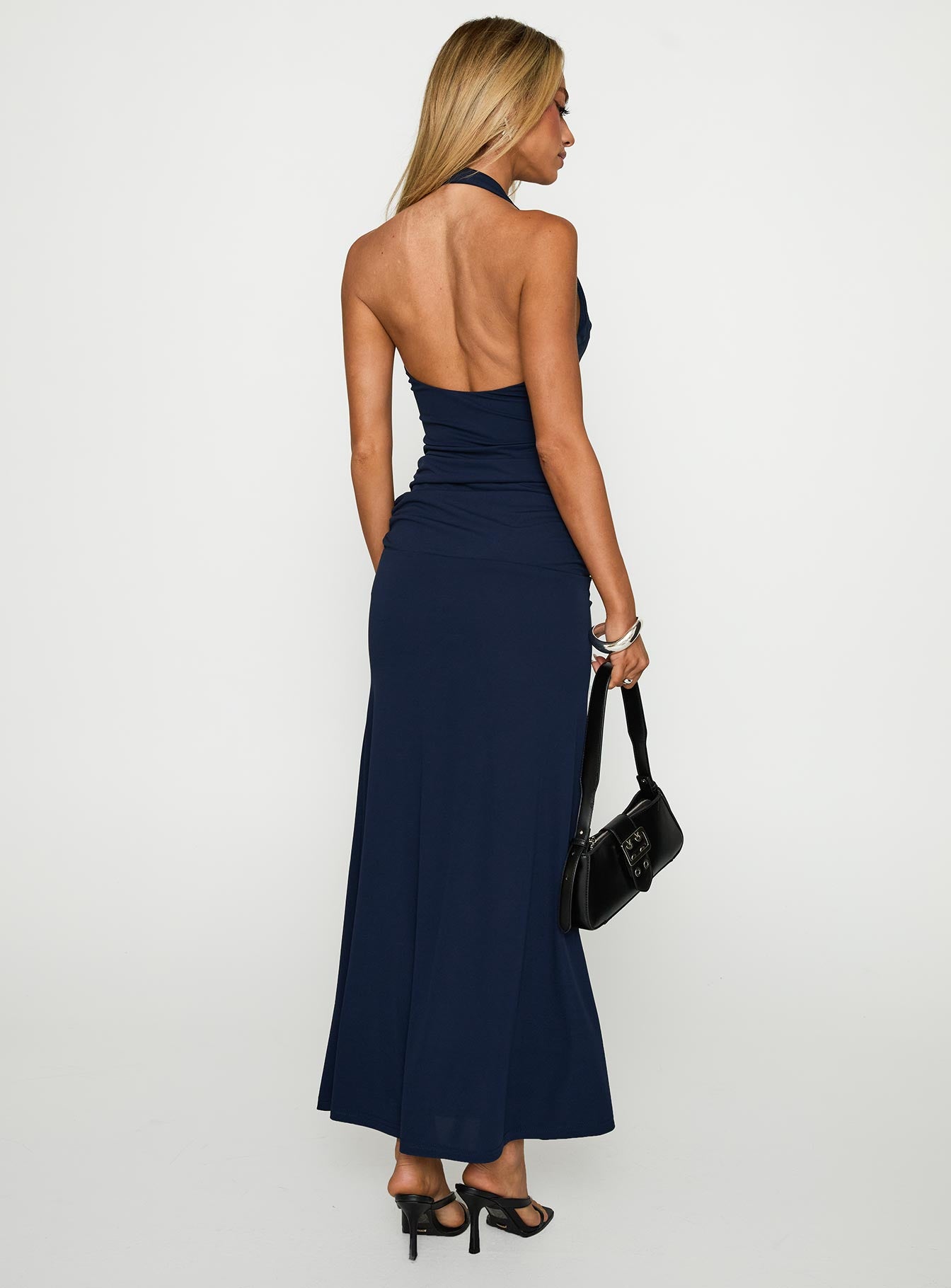 back view of model wearing Princess Polly Casino Halter Maxi Navy Plunger 