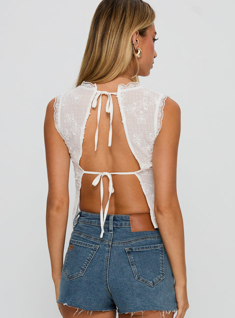 back view of model wearing Princess Polly Hagea Top White Sleeveless Plunger 