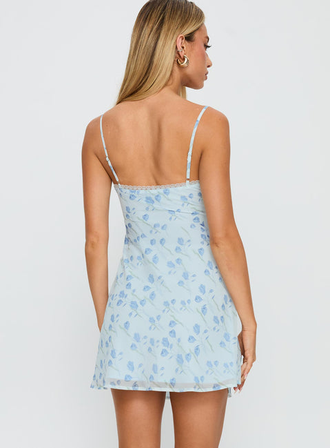 back view of model wearing Princess Polly Valencia Mini Dress Blue / Floral Scoop Neck 
