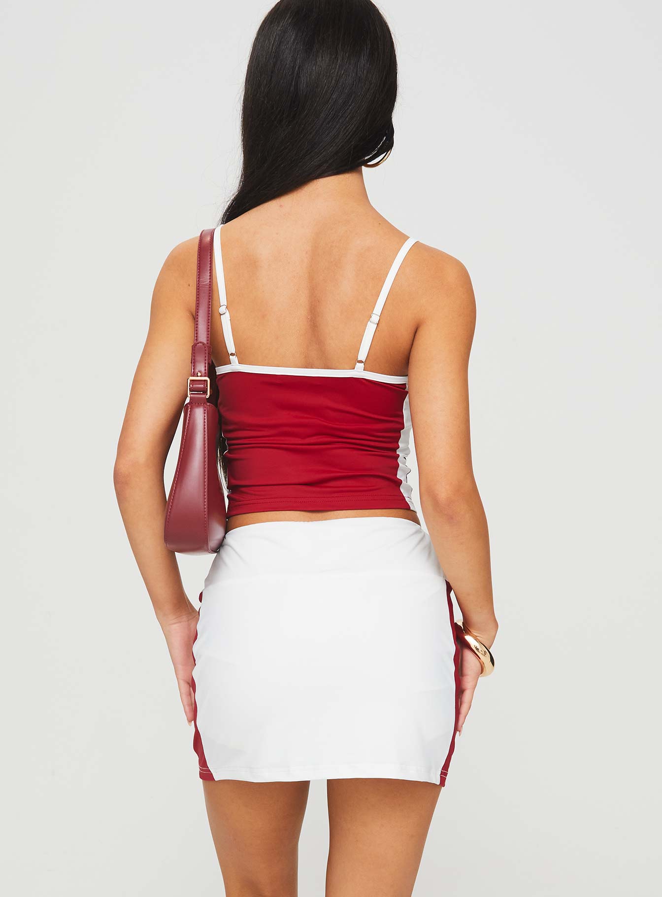 back view of model wearing Princess Polly Tex Skort White / Red 