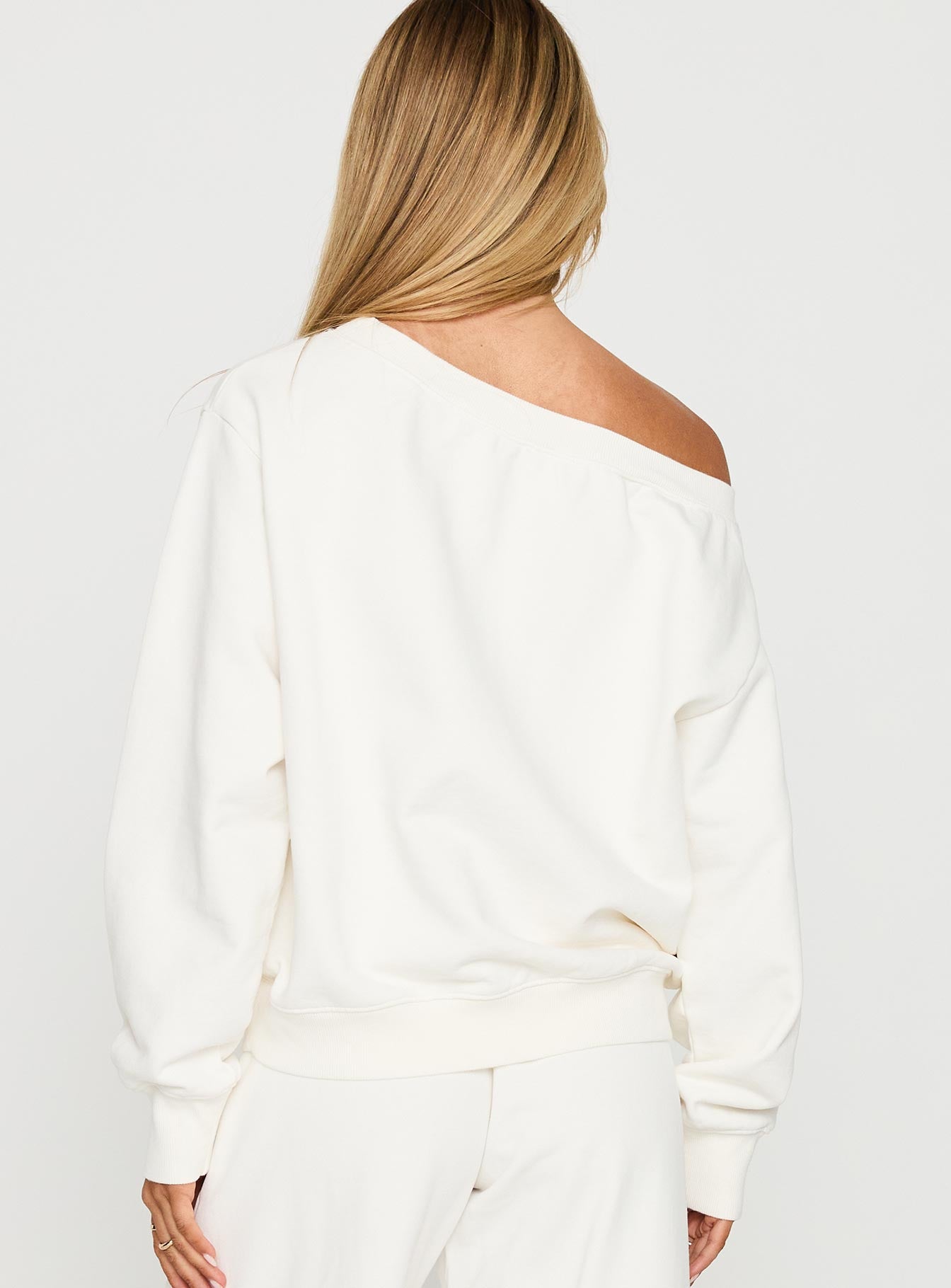 back view of model wearing Princess Polly Wellness Off The Shoulder Jumper Washed White 