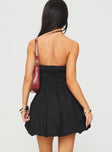 back view of model wearing Princess Polly Zafira Strapless Bubble Hem Mini Dress Black Sweetheart Neckline 