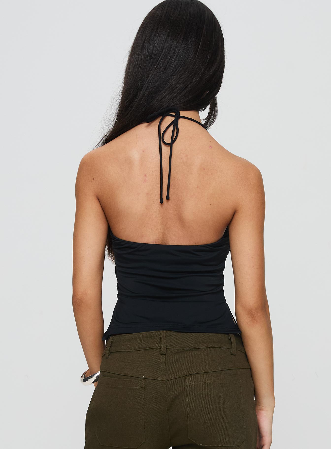 back view of model wearing Princess Polly Rehna Halter Top Black Sleeveless Sweetheart 