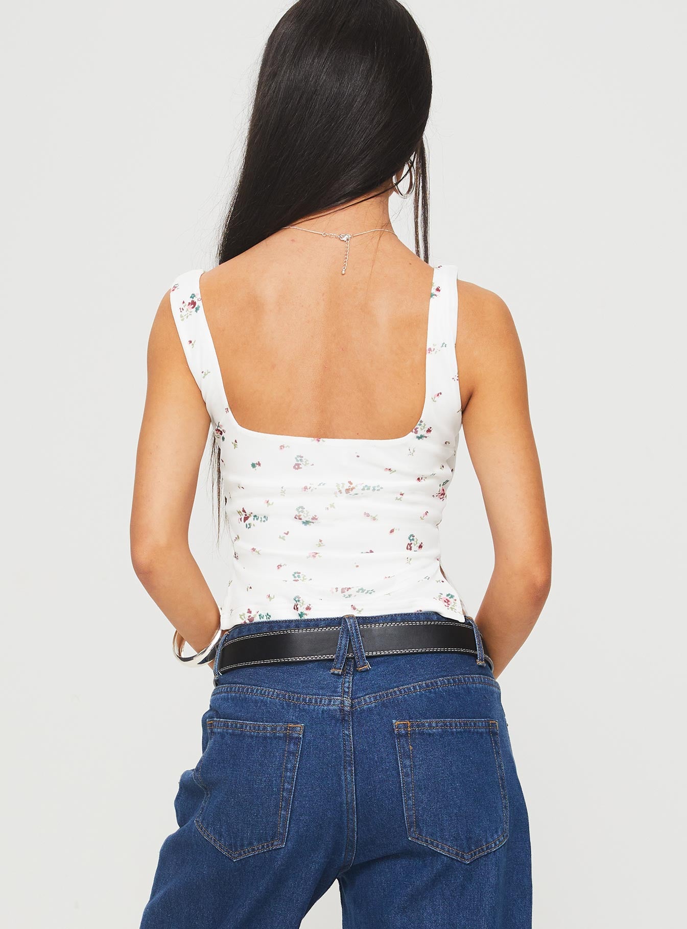 back view of model wearing Princess Polly Rehna Top White Floral Sleeveless V-Neck 